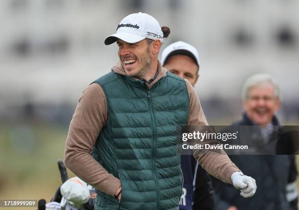 Gareth Bale of Wales the former international soccer player walks to his second shot on the second hole during the first round of the Alfred Dunhill...