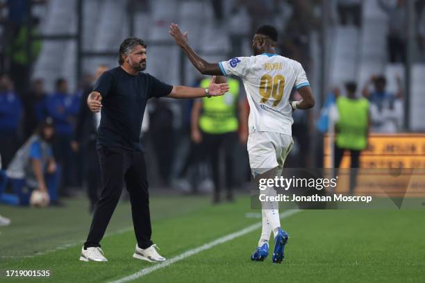 Chancel Mbemba Mangulu of Olympique De Marseille celebrates with Gennaro Gattuso Head coach of Olympique De Marseille after scoring to give the side...