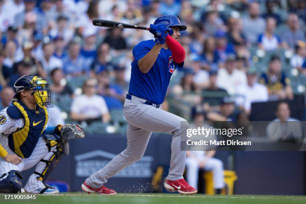 Jeimer Candelario of the Chicago Cubs bats in a game against the Milwaukee Brewers at American Family Fields on October 1, 2023 in Milwaukee,...