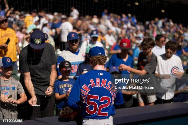 Pete Crow-Armstrong of the Chicago Cubs signs autographs before a game against the Milwaukee Brewers at American Family Fields on October 1, 2023 in...