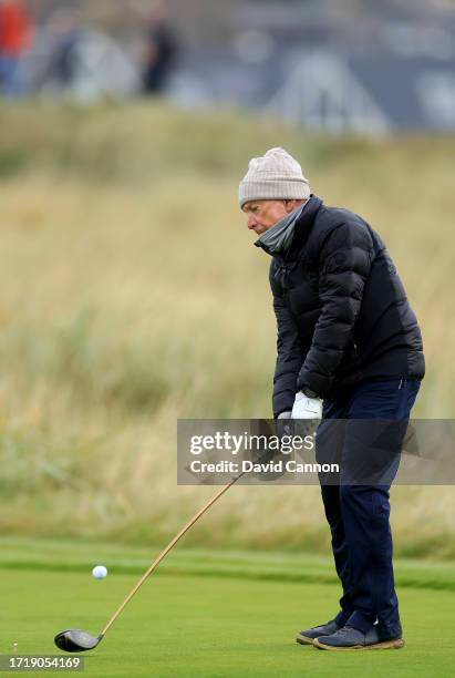 Michael Bloomberg of The United States the former mayor of New York plays his tee shot on the second hole during the first round of the Alfred...