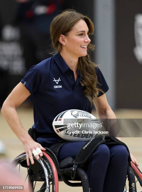 Catherine, Princess of Wales tries her hand at wheelchair rugby and joins a training session facilitated by members of the world-cup winning England...