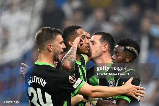 Joao Pedro of Brighton & Hove Albion celebrates with teammates after scoring the team's second goal during the UEFA Europa League match between...