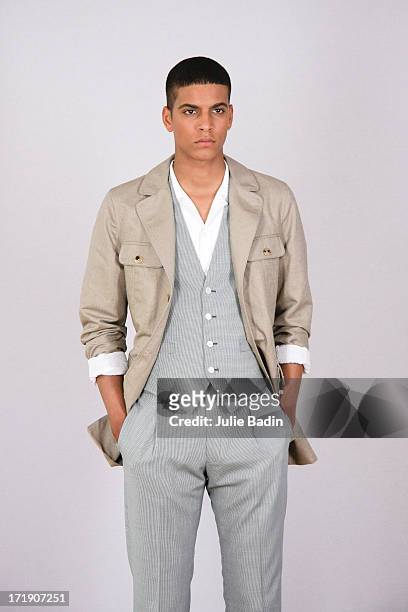 Model posing for a photographer before the Francesco Smalto Menswear Spring/Summer 2014 Show As Part Of The Paris Fashion Week on June 29, 2013 in...
