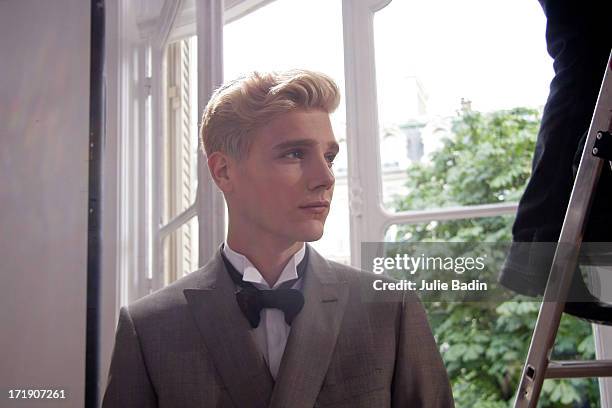 Model waits before the Francesco Smalto Menswear Spring/Summer 2014 Show As Part Of The Paris Fashion Week on June 29, 2013 in Paris, France.