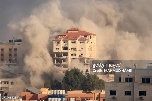 Smoke plumes billow following Israeli bombardment in Gaza City on October 11, 2023 on the fifth day of fighting between Israel and the Hamas...