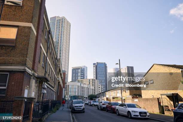 New apartment blocks beyond terraced housing and flats at the Carpenters Estate in the Stratford area of London, UK, on Saturday, Sept. 23. 2023....