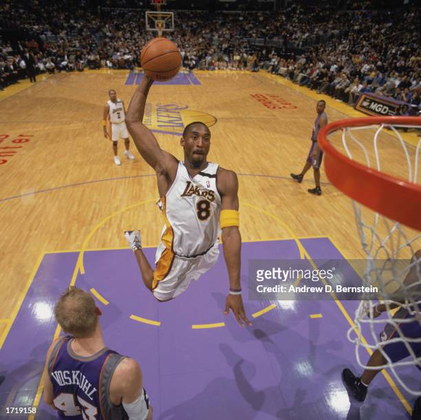 Kobe Bryant of the Los Angeles Lakers goes up for the dunk during the game against the Phoenix Suns at Staples Center on January 5, 2003 in Los...