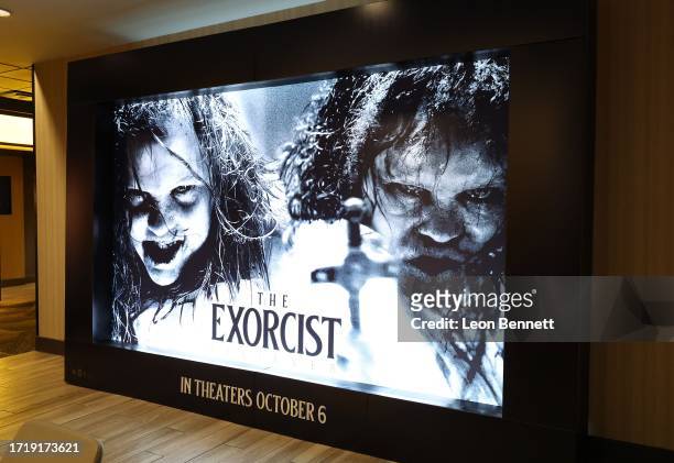 Signage is displayed during a special influencer screening of "The Exorcist: Believer" hosted by Tyga at AMC CityWalk on October 04, 2023 in Los...