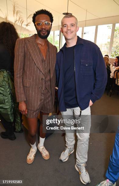 Omari Douglas and Russell Tovey attend a lunch hosted by Eva Langret and Jefferson Hack during the VIP Preview of the Frieze Art Fair 2023 in Regents...