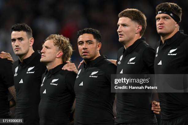 Will Jordan, Damian McKenzie, Anton Lienert-Brown, Jordie Barrett and Scott Barrett of New Zealand line up during the National Anthems prior to the...