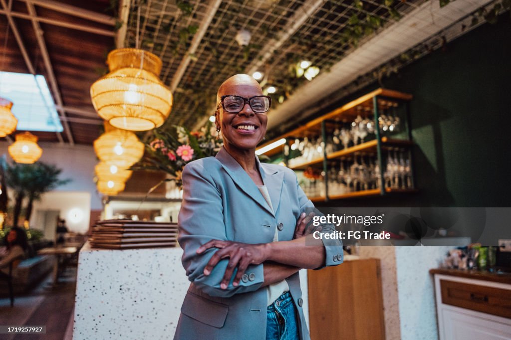 Portrait of a mature entrepreneur woman at coffee shop