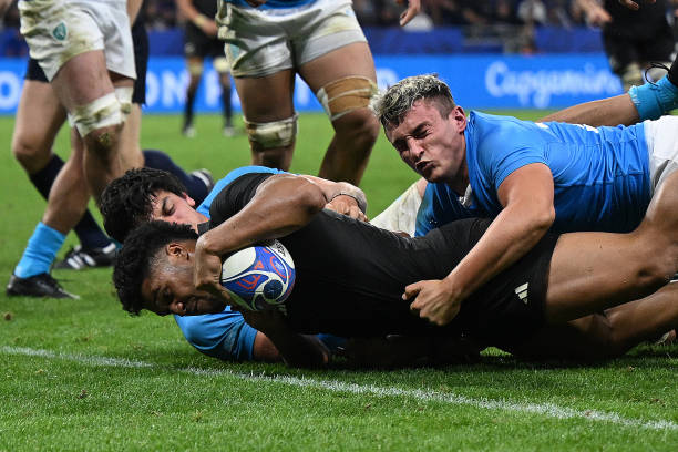 Leicester Fainga'anuku of New Zealand scores his team's eleventh try during the Rugby World Cup France 2023 match between New Zealand and Uruguay at...