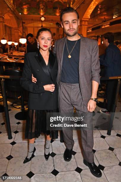 Bel Powley and Douglas Booth attend Harrods Iconic Dining Hall relaunch hosted by Stanley Tucci on October 5, 2023 in London, England.