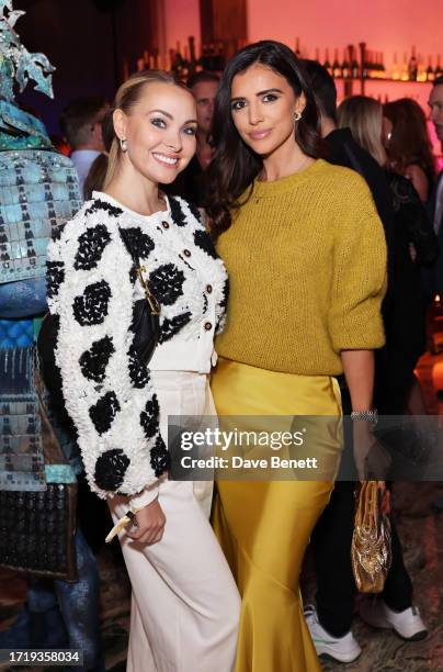 Caroline Thomas and Lucy Mecklenburgh attend the Sexy Fish Manchester Launch Party on October 05, 2023 in Manchester, England.