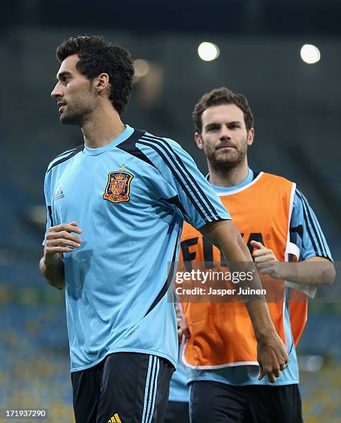 Alvaro Arbeloa and Juan Mata of Spain look on during a training session, ahead of their FIFA Confederations Cup Brazil 2013 Final match against...