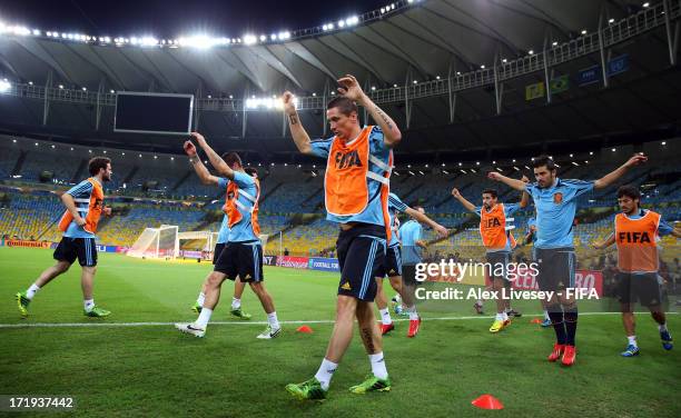 Fernando Torres of Spain warms up during a training session, ahead of their FIFA Confederations Cup Brazil 2013 Final match against Brazil, at the...