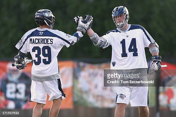 Matt Mackrides of the Chesapeake Bayhawks celebrates his goal with Drew Westervelt during Major League Lacrosse game action against the Hamilton...