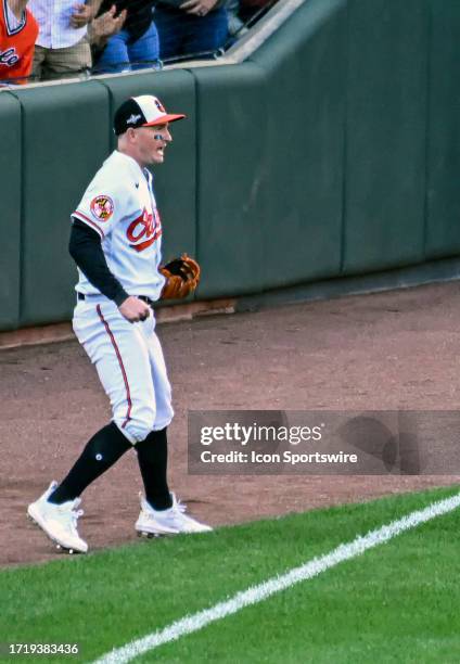 October 07: Baltimore Orioles left fielder Austin Hays reacts after making a diving catch during the Texas Rangers versus the Baltimore Orioles on...