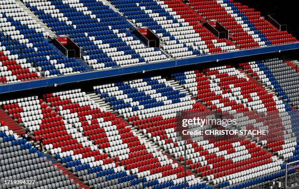 General view taken on October 11, 2023 shows the logo of FC Bayern Munich on the stands inside the Allianz Arena Stadium, home stadium of German...