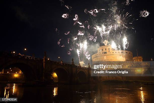 Fireworks explode over Castel Sant'Angelo on June 29, 2013 in Rome, Italy. The traditional 'La Girandola' fireworks celebrate Saints Peter and Paul,...