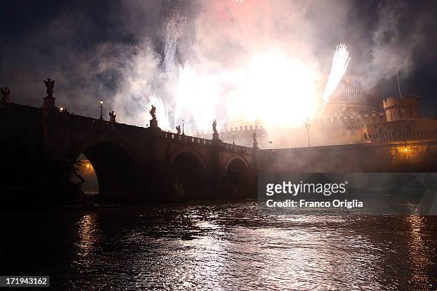 Fireworks explode over Castel Sant'Angelo on June 29, 2013 in Rome, Italy. The traditional 'La Girandola' fireworks celebrate Saints Peter and Paul,...