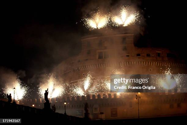 Fireworks explode over Castel Sant'Angelo on June 29, 2013 in Rome, Italy. The traditional 'La Girandola' fireworks celebrate Saints Peter and Paul,...