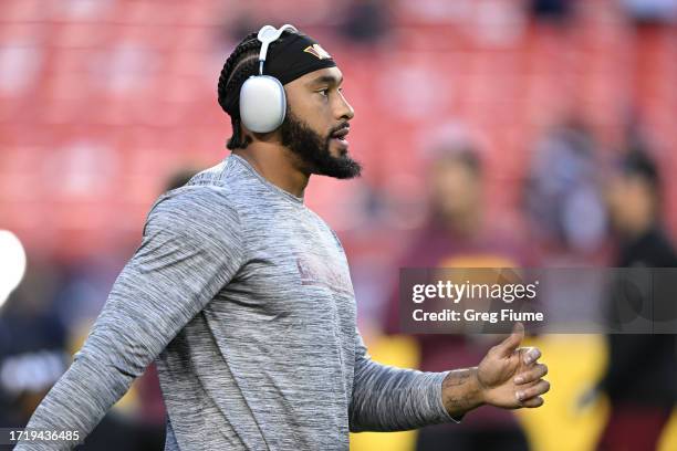 Montez Sweat of the Washington Commanders warms up before the game against the Chicago Bears at FedExField on October 05, 2023 in Landover, Maryland.