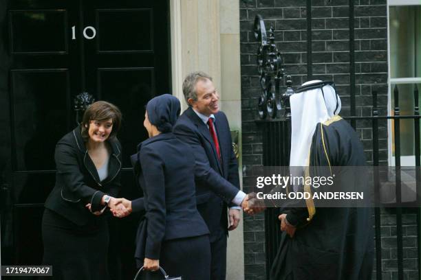 British Prime Minister Tony Blair and his wife Cherie greet the Emir of Qatar Hamad Bin Khalifa Al-Thani and his wife Sheikha Mozah Bint Nasser...