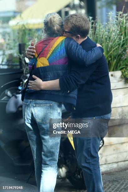 James Corden and Julia Carey are seen on October 9, 2023 in London, United Kingdom.