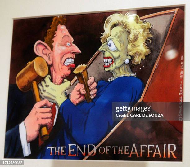 Cartoon featuring British Prime Minister Tony Blair and former Conservative Prime Minister Margaret Thatcher by British cartoonist Steve Bell is seen...