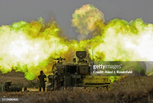An IDF artillery unit fires towards Gaza on October 11, 2023 near Netivot, Israel. Israel has sealed off Gaza and conducted airstrikes on Palestinian...