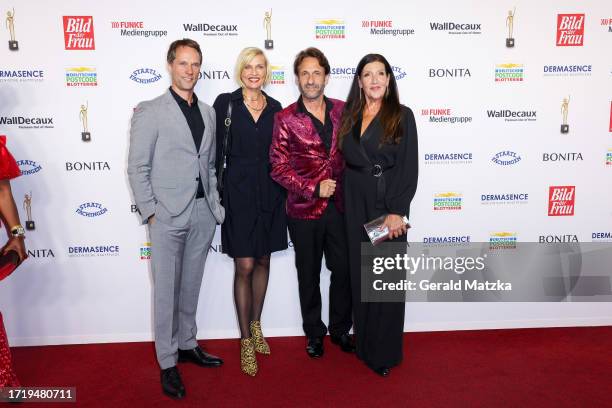 Marco Fischer, Sanna Englund, Falk-Willy Wild and Katy Karrenbauer attend "Goldene Bild der Frau" Award 2023 at Stage Theater on October 11, 2023 in...
