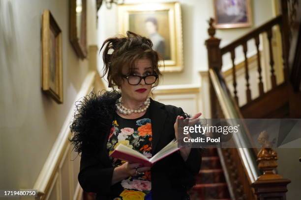 Helena Bonham Carter reading a poem during a reception celebrating 30 years of the Forward Arts Foundation at Clarence House on October 11, 2023 in...