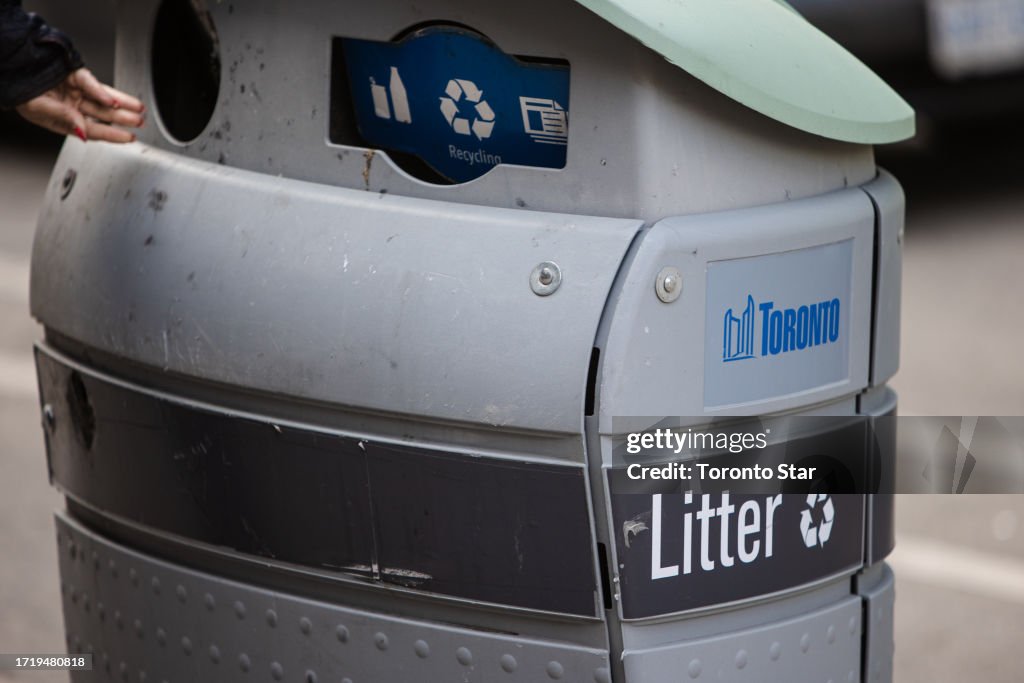 City of Toronto garbage bins featuring the "chasing arrows" symbol