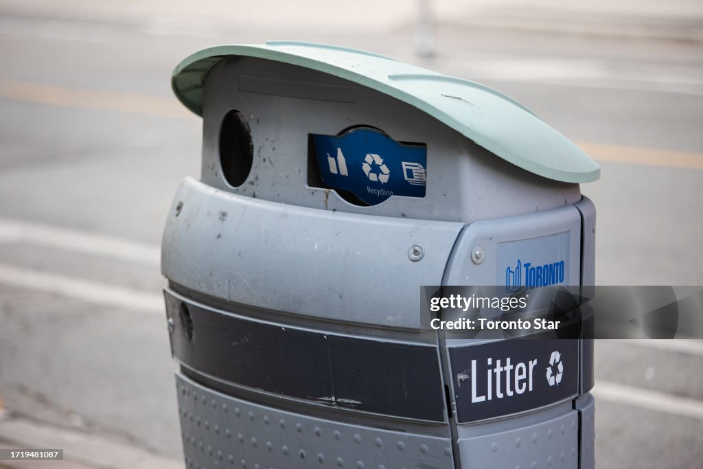 City of Toronto garbage bins featuring the "chasing arrows" symbol