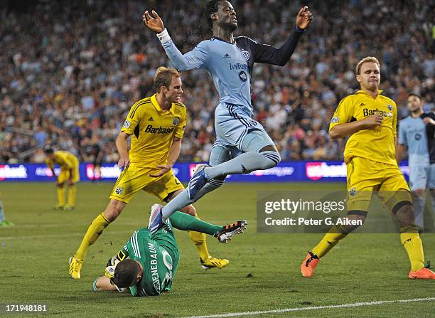 Goal keeper Andy Gruenebaum of the Columbus Crew makes a save on a shot form forward Kei Kamara of Sporting Kansas City during the second half on...