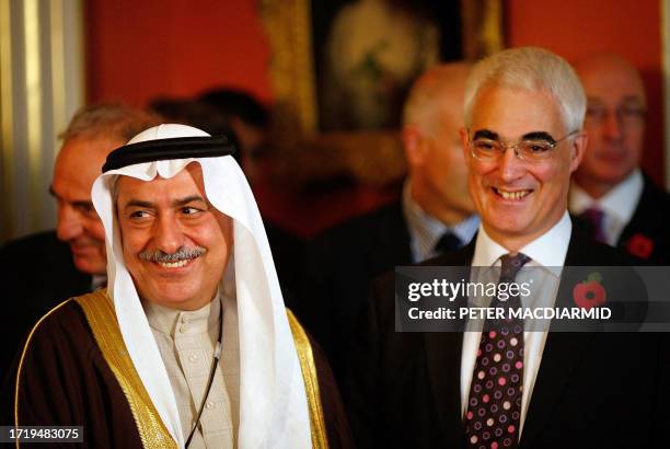 Saudi Minister of Finance Dr Ibrahim bin Abdulaziz bin Abdullah Al-Assaf stands with Britain's Finance Minister Alistair Darling before attending a...