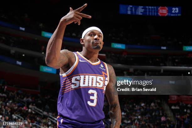 Bradley Beal of the Phoenix Suns celebrates a three point basket against the Detroit Pistons on October 8, 2023 at Little Caesars Arena in Detroit,...