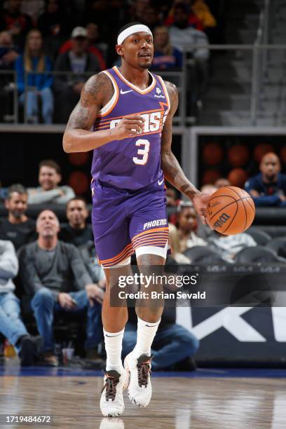 Bradley Beal of the Phoenix Suns brings the ball up court against the Detroit Pistons on October 8, 2023 at Little Caesars Arena in Detroit,...