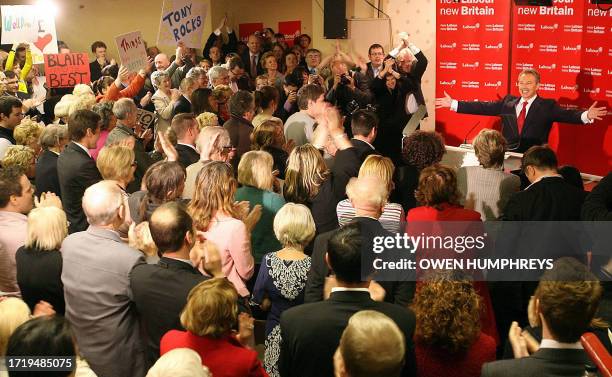 Britain's Prime Minister Tony Blair gestures as he announces his resignation at the Trimdon Labour Club, in Sedgefield, north-east England, 10 May...