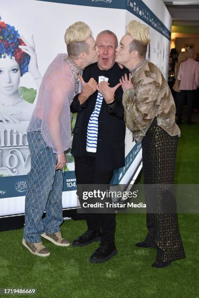 French fashion designer Jean Paul Gaultier and John Grimes and Edward Grimes of the UK music duo Jedward attend the "Falling in love" grand show...