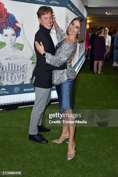 Renata Lusin and Valentin Lusin attend the "Falling in love" grand show premiere at Friedrichstadt-Palast on October 11, 2023 in Berlin, Germany.