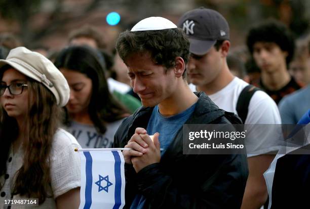 Los Angeles, CA - USC students attend an evening vigil on campus in support of Israel amid the conflict between Israel and the Palestinian militant...