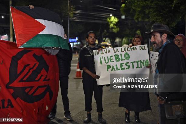 Group of people demonstrate in support of Palestinians and against Israel's military operations in Gaza, in front of the US embassy in La Paz, on...