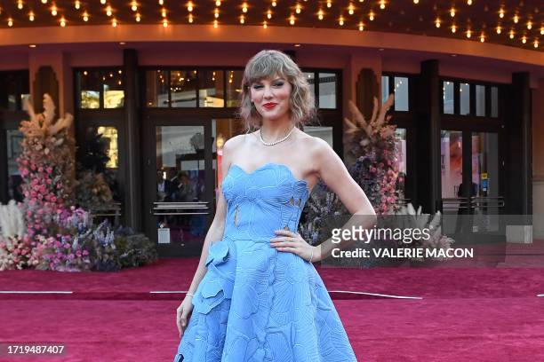 Singer Taylor Swift arrives for the "Taylor Swift: The Eras Tour" concert movie world premiere at AMC The Grove in Los Angeles, California on October...