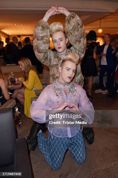 John Grimes and Edward Grimes of the UK music duo Jedward during the "Falling in love" grand show premiere at Friedrichstadt-Palast on October 11,...