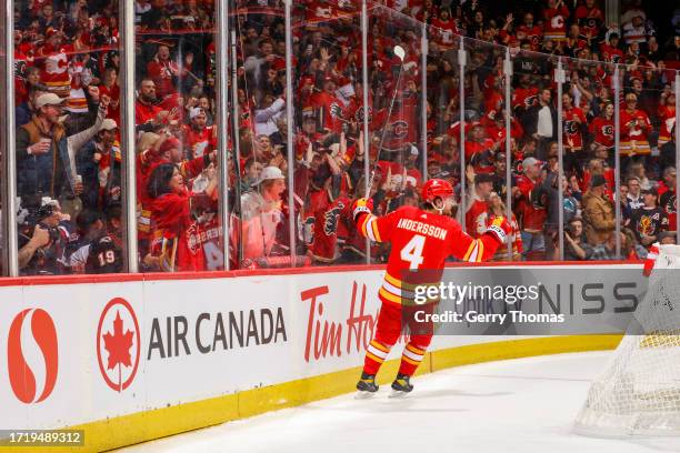 Rasmus Andersson of the Calgary Flames celebrates a goal against the Winnipeg Jets at the Scotiabank Saddledome on October 11, 2023 in Calgary,...