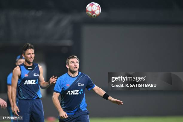 In this picture taken on on October 11 New Zealand's Tom Latham plays football during a training session at the M. A. Chidambaram Stadium in Chennai...