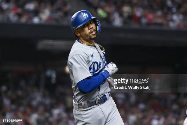 October 11: Los Angeles Dodgers Mookie Betts runs along the base line after being out at first during game three of the National League Division...
